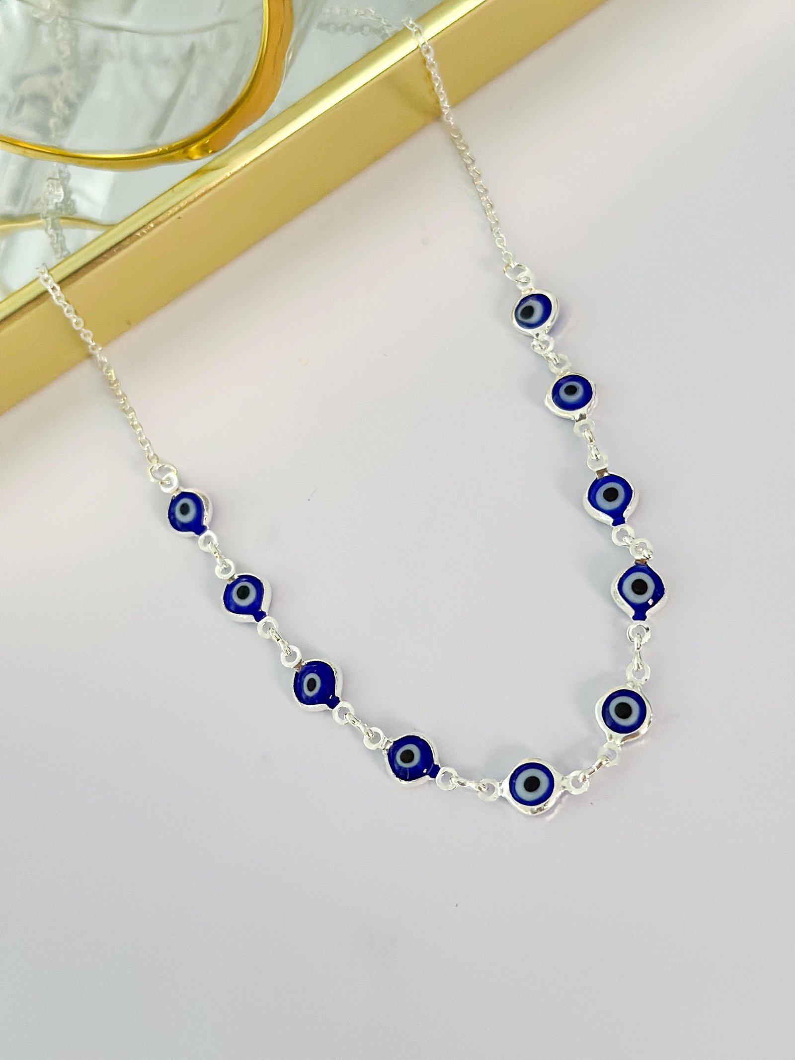 Chocker Folheada Olho Grego